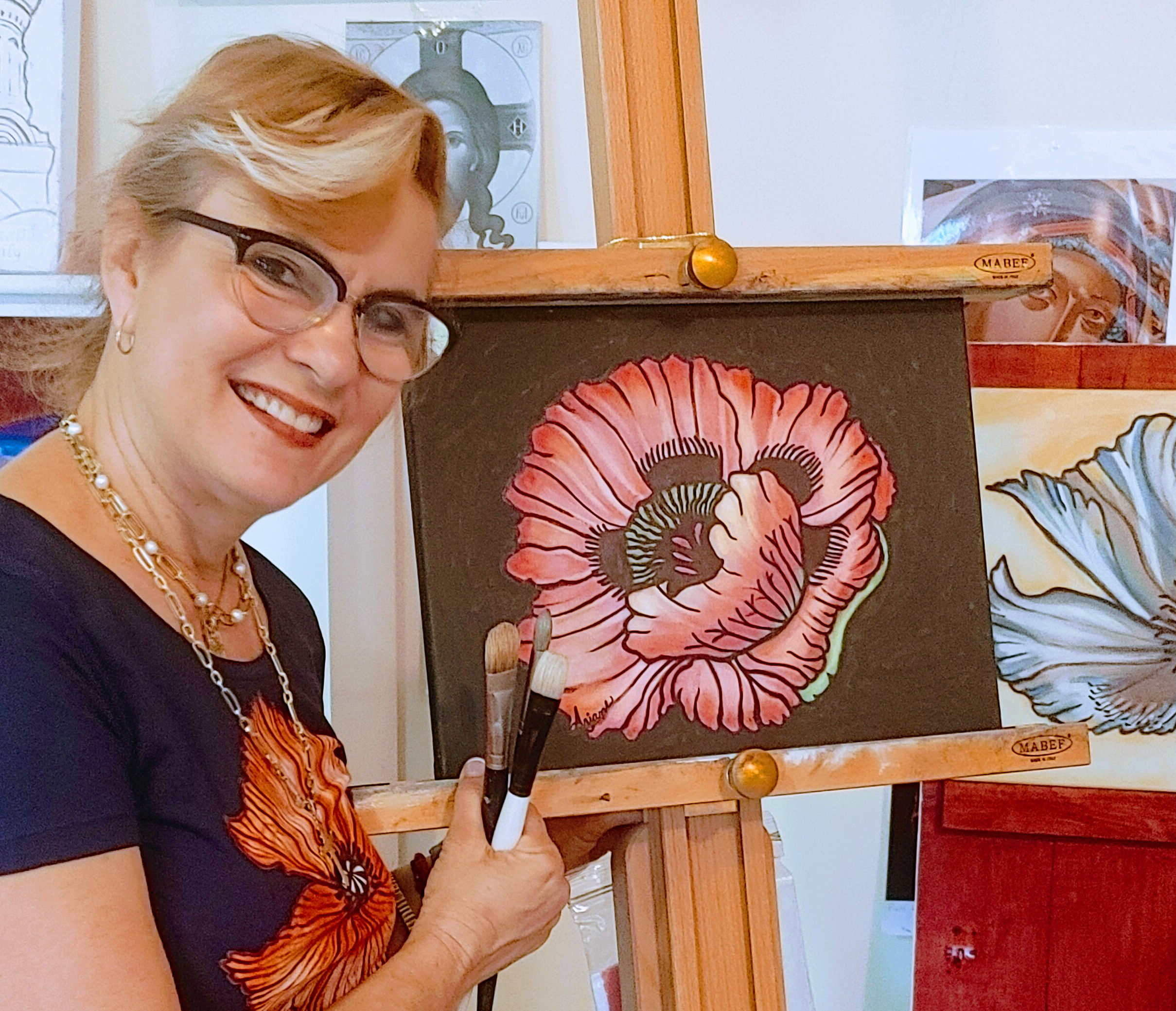  Ariane with one of her poppy paintings 